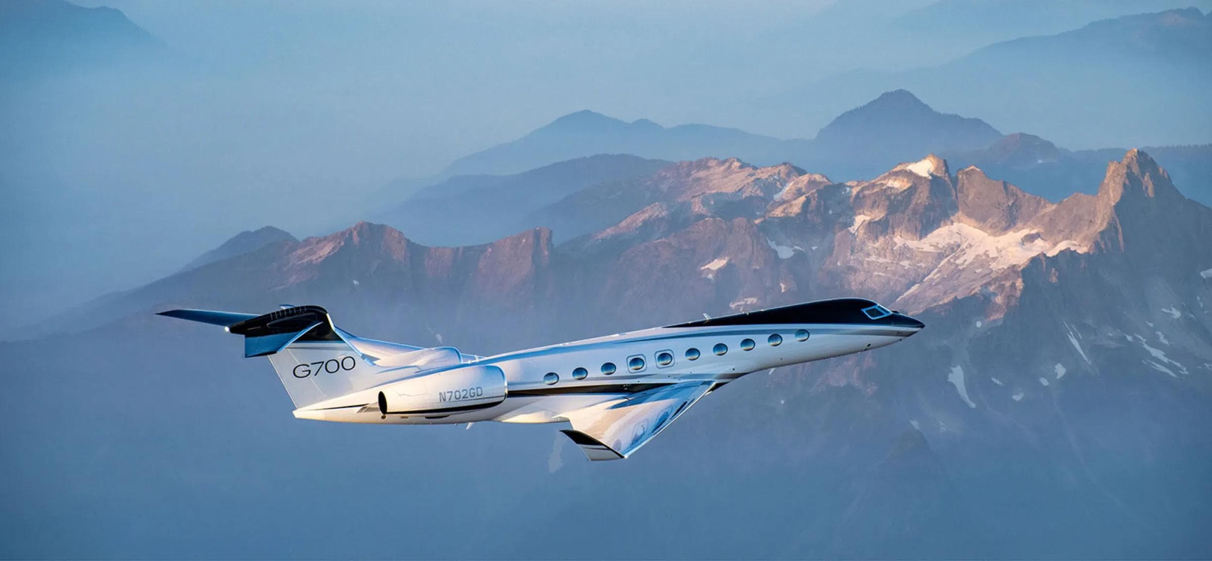 Gulfstream G700 ultra-long-range business jet exterior beauty shot, three-quarter view on tarmac